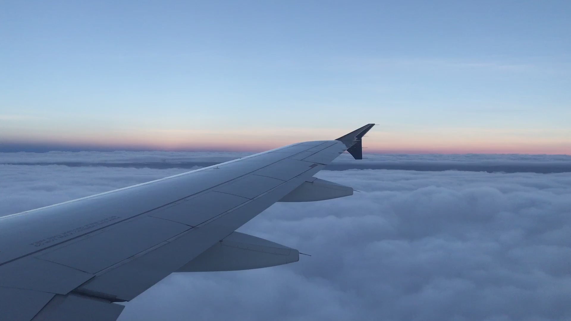 airplane flying through the cloudst Interactive Airport Intelligence™